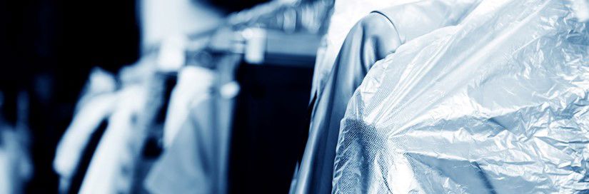 Dry Cleaned Suits Hanging Min