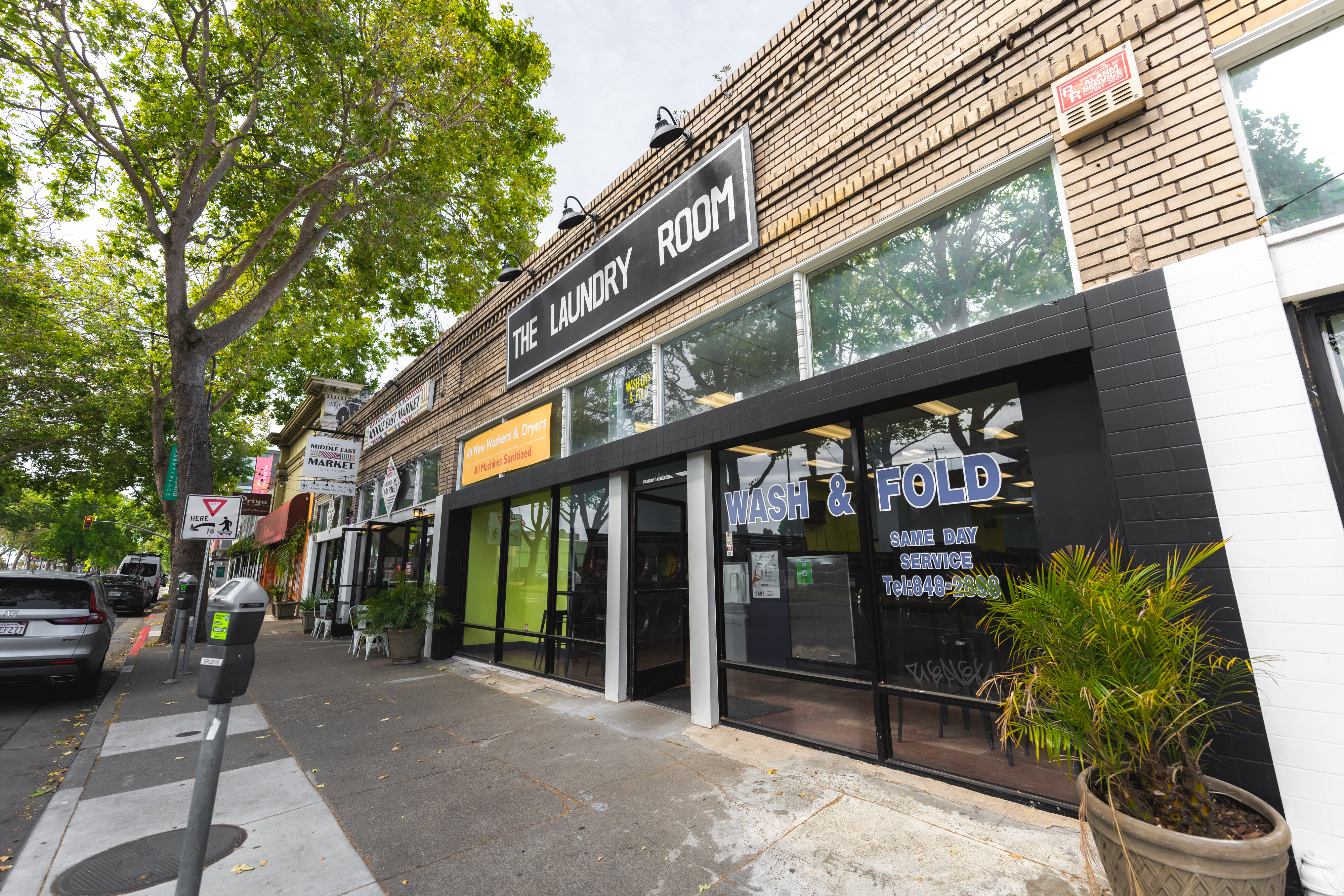 Storefront Exterior With Street Trees